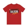 Tshirt rojo con texto de color blanco, amarillo y negro y la frase: tipo sanguíneo, salsera positiva. Mujer salsera